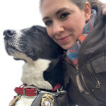 梅根·马尔切蒂 (Meghan Marchetti) 和退休的 K 9 Comet。